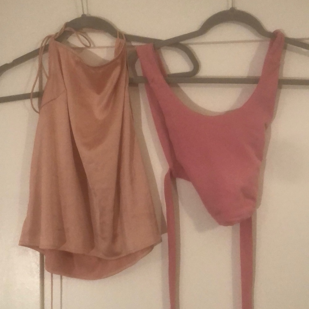 Two pink crop tops